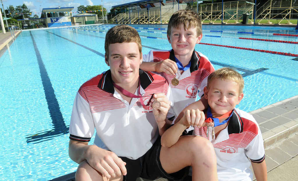 Scott Gear, Darcy Cartwright and Troy Carlson won medals at the Queensland Schools swimming carnival. Scott Gear, Darcy Cartwright and Troy Carlson won medals at the Queensland Schools swimming carnival.