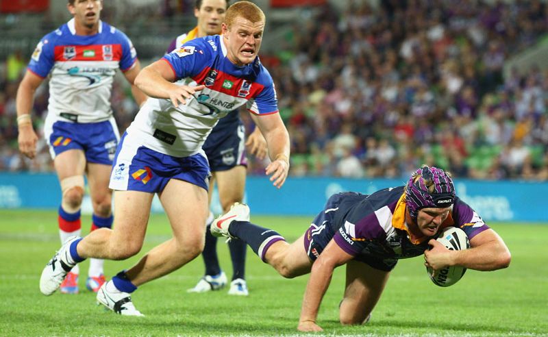 Todd Lowrie of the Storm scores a try during the round five NRL match between the Melbourne Storm and the Newcastle Knights at AAMI Park Todd Lowrie of the Storm scores a try during the round five NRL match between the Melbourne Storm and the Newcastle Knights at AAMI Park