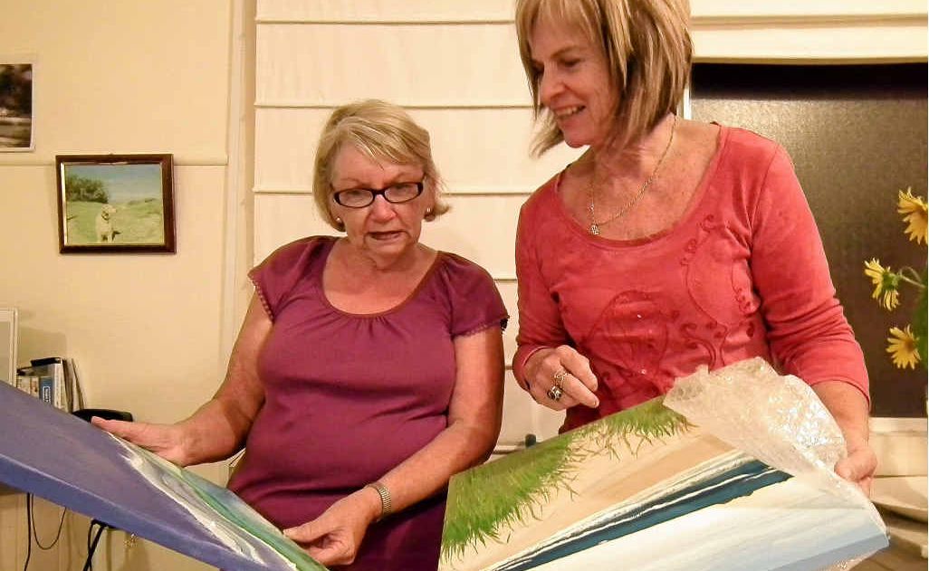 Wooli Artshow committee members Ruth Boyd and Leone Coper unpacking some of the entries. Wooli Artshow committee members Ruth Boyd and Leone Coper unpacking some of the entries.