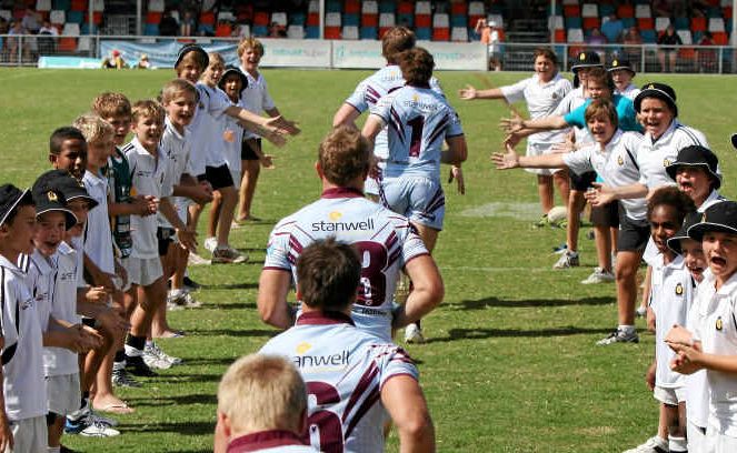 Rockhampton schoolboys’ representative players welcome the Capras on to the field for the Intrust Super Cup match with Ipswich. Rockhampton schoolboys’ representative players welcome the Capras on to the field for the Intrust Super Cup match with Ipswich.