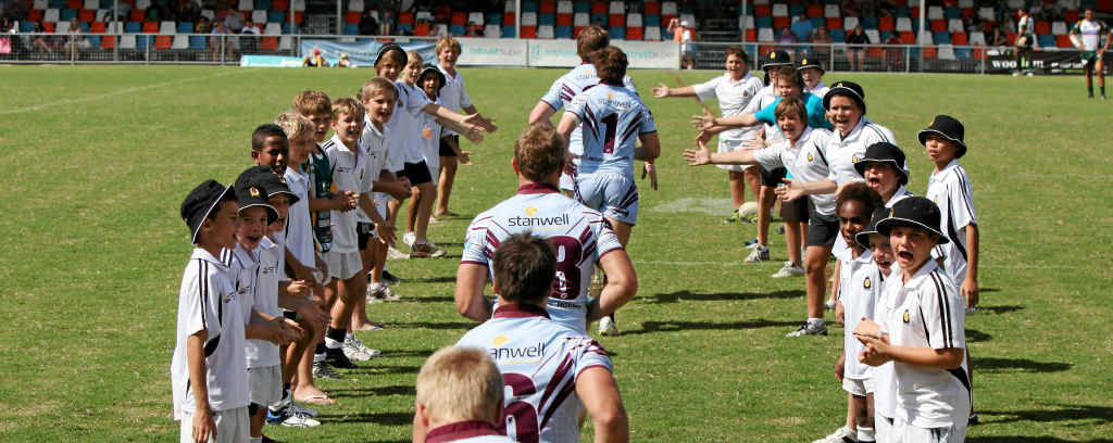 Rockhampton schoolboys’ representative players welcome the Capras on to the field for the Intrust Super Cup match with Ipswich. Rockhampton schoolboys’ representative players welcome the Capras on to the field for the Intrust Super Cup match with Ipswich.