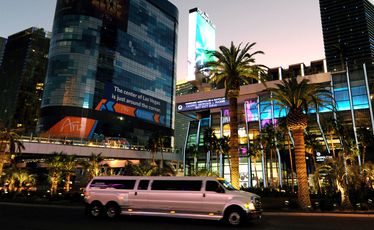 A stretch limo cruises the Las Vegas Strip. A stretch limo cruises the Las Vegas Strip.