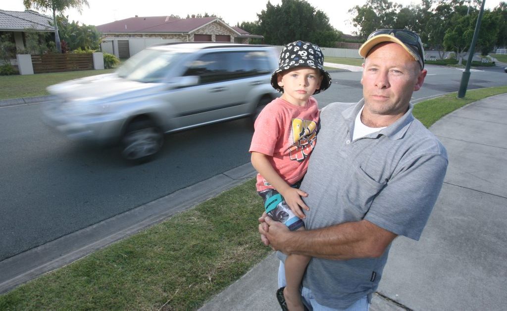 Ross Dionysius with his son Rhys outside the Winston Glades Early Education Centre. Ipswich City Council is looking to introduce 40km/ph speed limits outside childcare centres in the region. Photo: Rob Williams / The Queensland Times Ross Dionysius with his son Rhys outside the Winston Glades Early Education Centre. Ipswich City Council is looking to introduce 40km/ph speed limits outside childcare centres in the region. Photo: Rob Williams / The Queensland Times