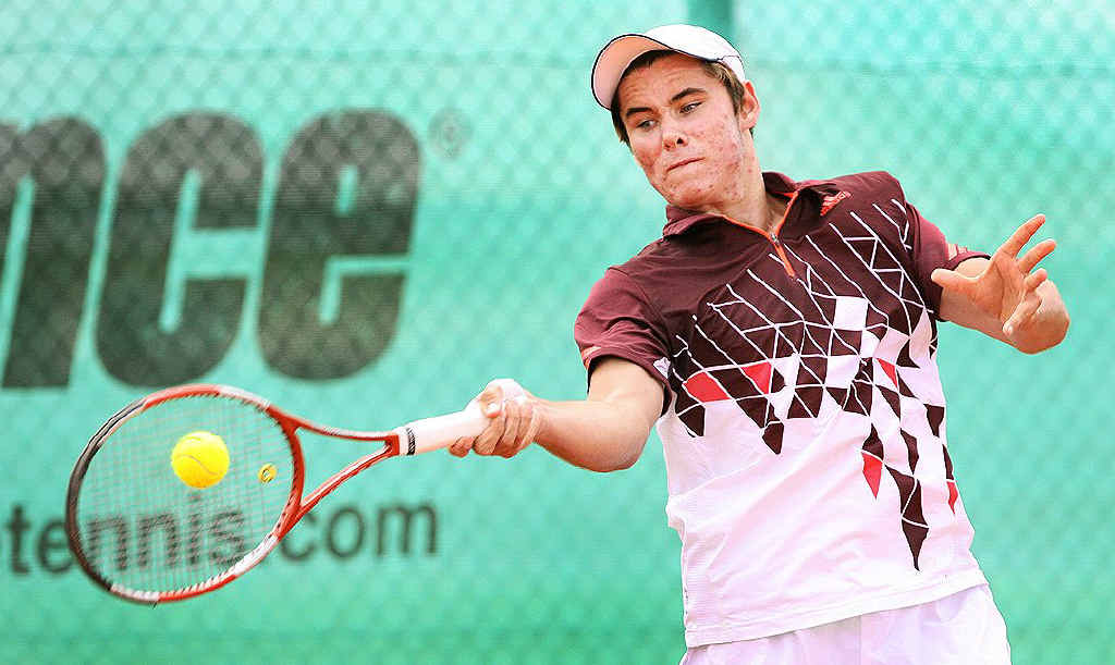 Ipswich tennis player Ryan Simmons battles hard during last week’s Optus 16s National Claycourt Championships at Leichhardt. Ipswich tennis player Ryan Simmons battles hard during last week’s Optus 16s National Claycourt Championships at Leichhardt.