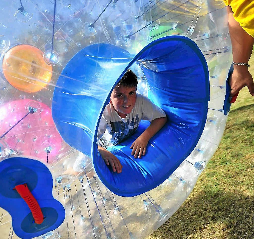 Grady Howard, 9, loved the harbour festival on Good Friday in this zorbing ball.