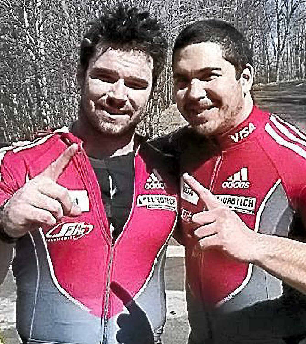 Former Coast- based bobsleigh pilot Chris Spring, right, with teammate Tim Randall. Former Coast- based bobsleigh pilot Chris Spring, right, with teammate Tim Randall.
