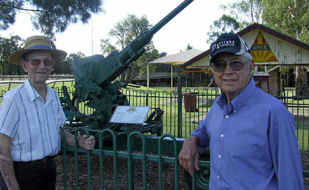 Allora RSL sub-branch members Eric Taylor and Rob Sinton inspect the restored Bofors 40mm light anti-aircraft gun which takes pride of place in Allora’s Apex Park. Allora RSL sub-branch members Eric Taylor and Rob Sinton inspect the restored Bofors 40mm light anti-aircraft gun which takes pride of place in Allora’s Apex Park.