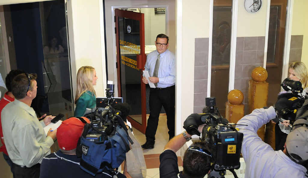 David Gibson emerges from his office to address reporters in Gympie yesterday. David Gibson emerges from his office to address reporters in Gympie yesterday.