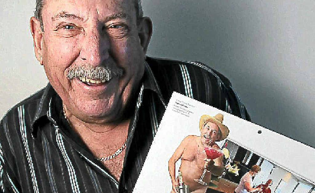 Graeme Preston with his pin-up. Graeme Preston with his pin-up.