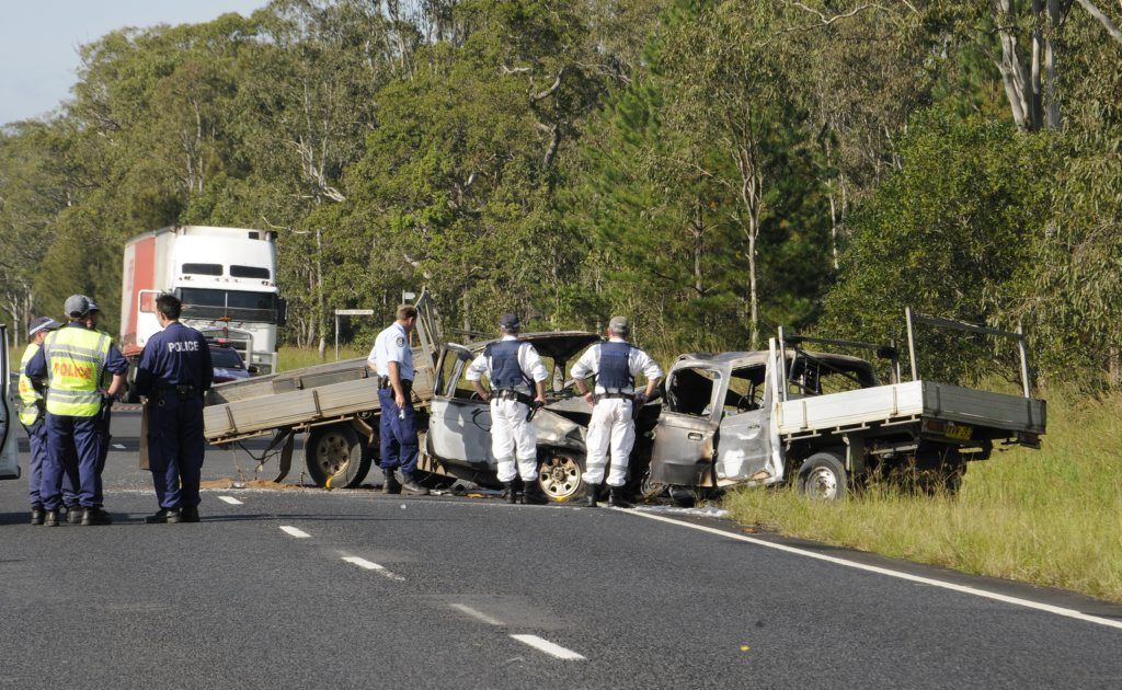 Police and emergency service personnel at the scene of the accident. Police and emergency service personnel at the scene of the accident.