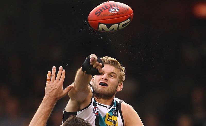 Jackson Trengove of the Power spoils a mark by Travis Cloke of the Magpies during the round four AFL match between the Collingwood Magpies and the Port Adelaide Power at Etihad Stadium. Jackson Trengove of the Power spoils a mark by Travis Cloke of the Magpies during the round four AFL match between the Collingwood Magpies and the Port Adelaide Power at Etihad Stadium.