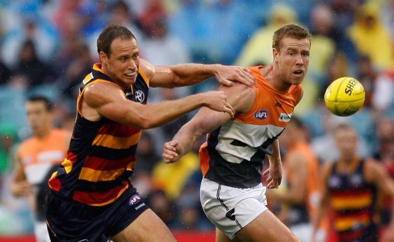 Ben Rutten of Adelaide Crows challenges Jonathan Giles of Greater Western Sydney Giants during round four of the AFL match at AAMI Stadium Ben Rutten of Adelaide Crows challenges Jonathan Giles of Greater Western Sydney Giants during round four of the AFL match at AAMI Stadium