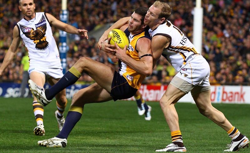 Jack Darling of the Eagles marks the ball against Michael Osborne of the Hawks during the round four AFL match between the West Coast Eagles and the Hawthorn Hawks at Patersons Stadium. Jack Darling of the Eagles marks the ball against Michael Osborne of the Hawks during the round four AFL match between the West Coast Eagles and the Hawthorn Hawks at Patersons Stadium.