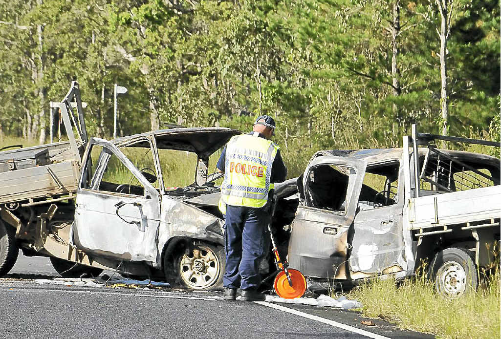 Police inspect the scene of the double fatality on the Summerland Way near the intersection with Leeville Station Rd. Police inspect the scene of the double fatality on the Summerland Way near the intersection with Leeville Station Rd.