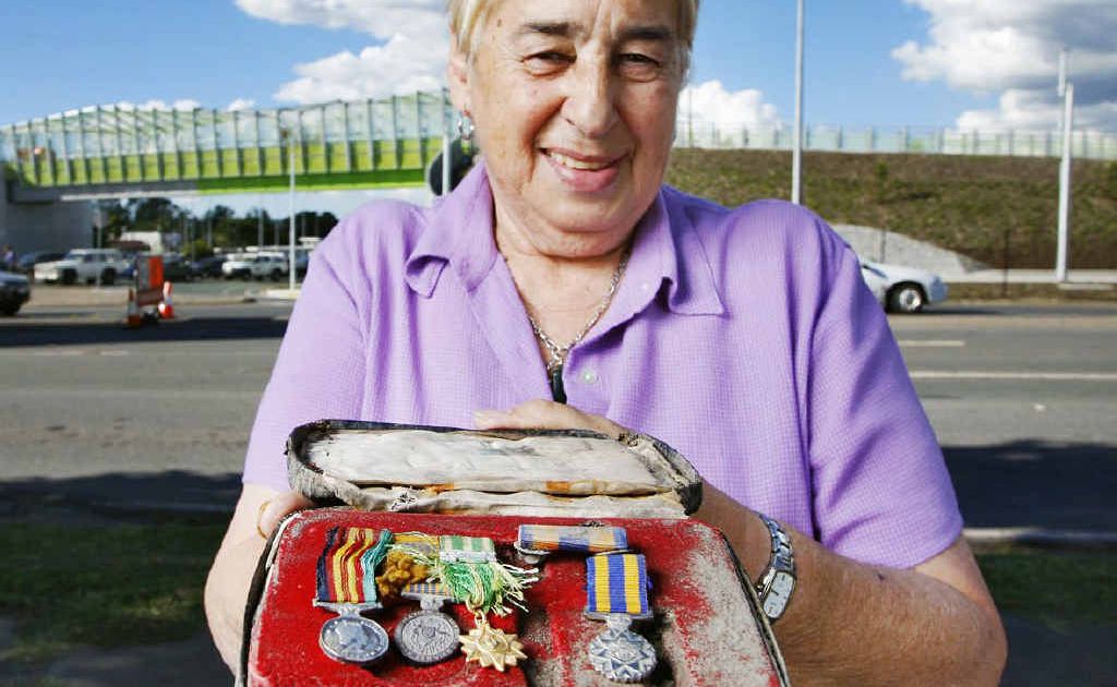Goodna RSL Sub-branch president Vivienne Stanbury with medals discovered at the motorway upgrade site in Dinmore. Goodna RSL Sub-branch president Vivienne Stanbury with medals discovered at the motorway upgrade site in Dinmore.