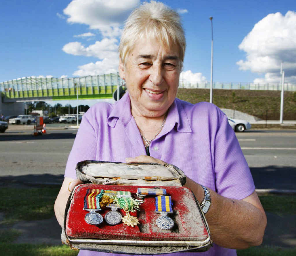 Goodna RSL Sub-branch president Vivienne Stanbury with medals discovered at the motorway upgrade site in Dinmore. Goodna RSL Sub-branch president Vivienne Stanbury with medals discovered at the motorway upgrade site in Dinmore.