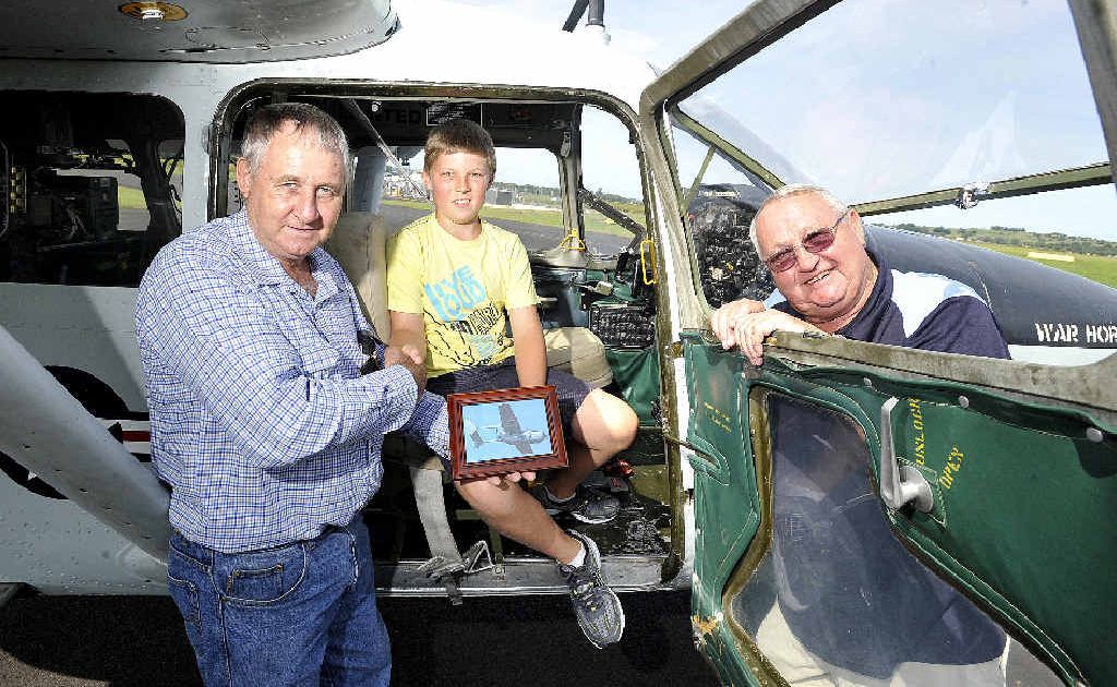 Lachlan Barnsley of Modanville with City of Lismore RSL Sub-branch president Cec Harris (right) and vice president of the Northern Rivers Aero Club Allan Fry. Lachlan Barnsley of Modanville with City of Lismore RSL Sub-branch president Cec Harris (right) and vice president of the Northern Rivers Aero Club Allan Fry.
