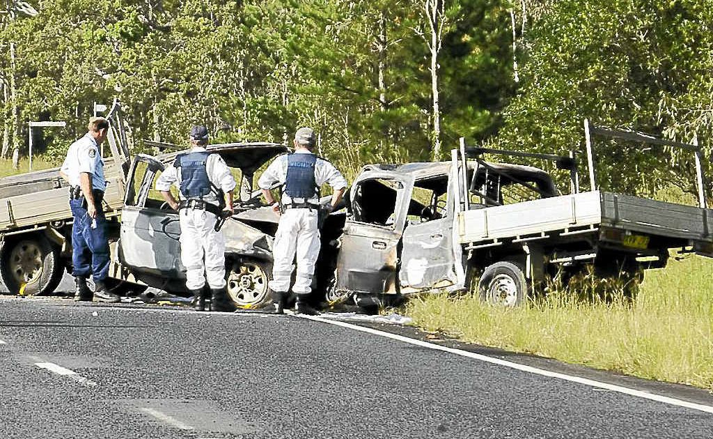 Police and emergency service personnel at the scene of a double fatality on the Summerland Way just north of the intersection with Leeville Station Rd, about 11km south of Casino, on Monday. Police and emergency service personnel at the scene of a double fatality on the Summerland Way just north of the intersection with Leeville Station Rd, about 11km south of Casino, on Monday.