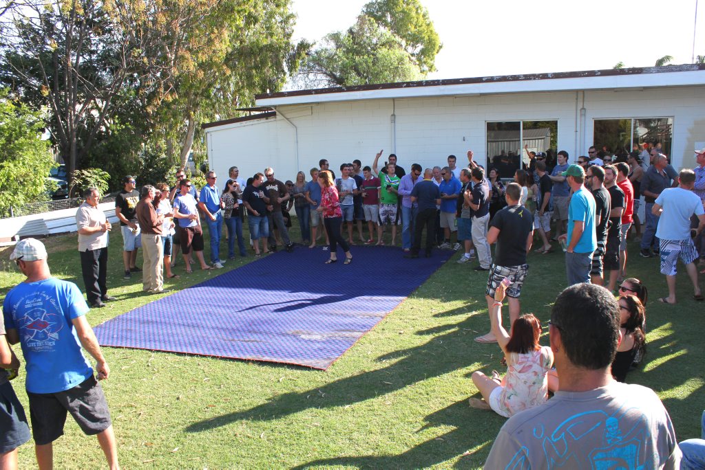 Patrons enjoy a game of Two-up at the Emerald Bowls Club on Anzac Day just hours before a man flew into a violent rampage at the venue. Patrons enjoy a game of Two-up at the Emerald Bowls Club on Anzac Day just hours before a man flew into a violent rampage at the venue.
