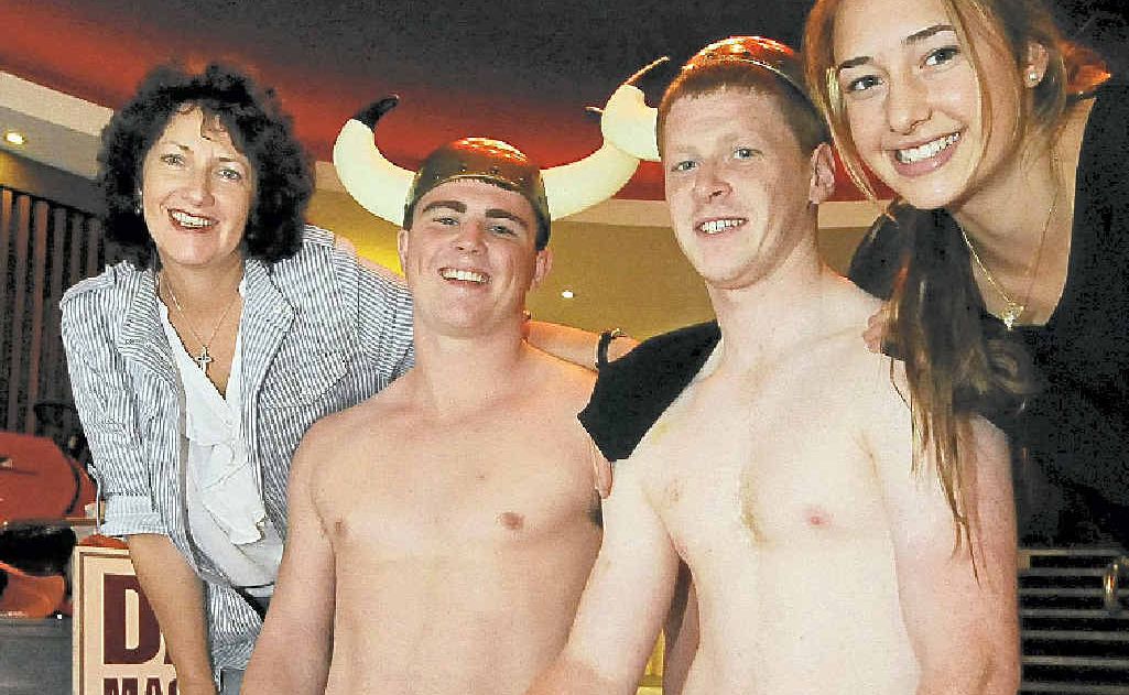 Karen Ludwig of Kyogle with her daughter Emily and Mr Beef entrants George Clarke and Nathan Conroy. Karen Ludwig of Kyogle with her daughter Emily and Mr Beef entrants George Clarke and Nathan Conroy.