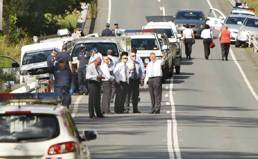 Police cars block Mt Crosby Road close to where the body of missing woman Allison Baden-Clay was found. Police cars block Mt Crosby Road close to where the body of missing woman Allison Baden-Clay was found.