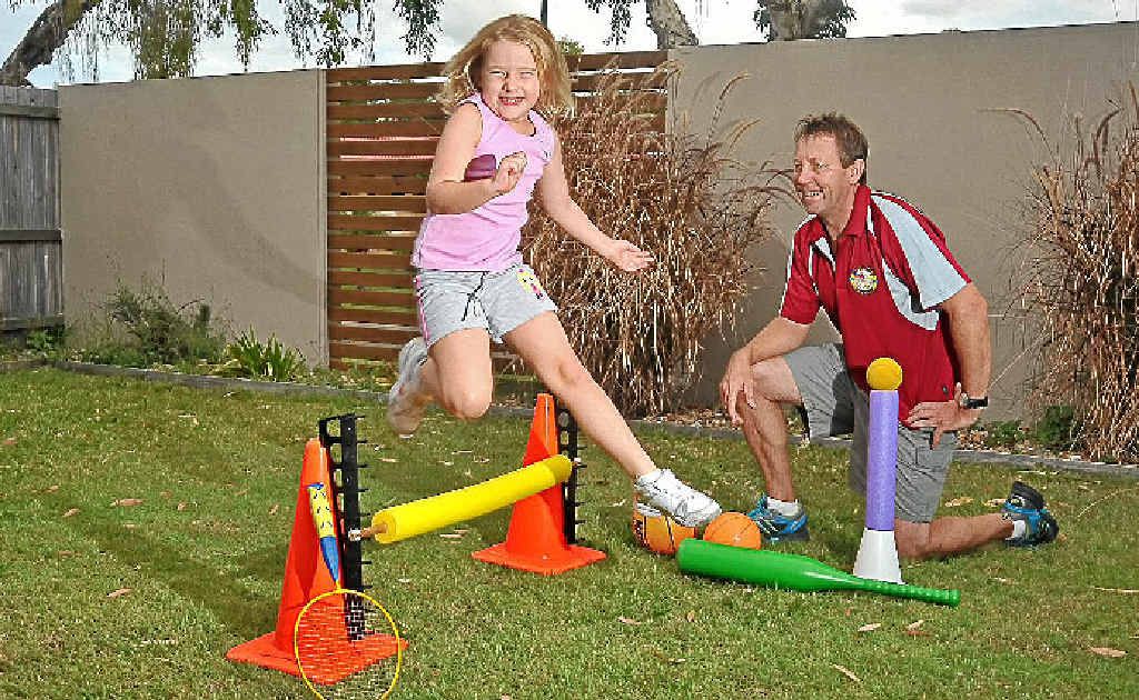 CONFIDENCE BOOST: Darryl Flashman, pictured with his daughter Rachael, 5, runs Sporty Tots, a sports program aimed at three to five-year-olds. CONFIDENCE BOOST: Darryl Flashman, pictured with his daughter Rachael, 5, runs Sporty Tots, a sports program aimed at three to five-year-olds.