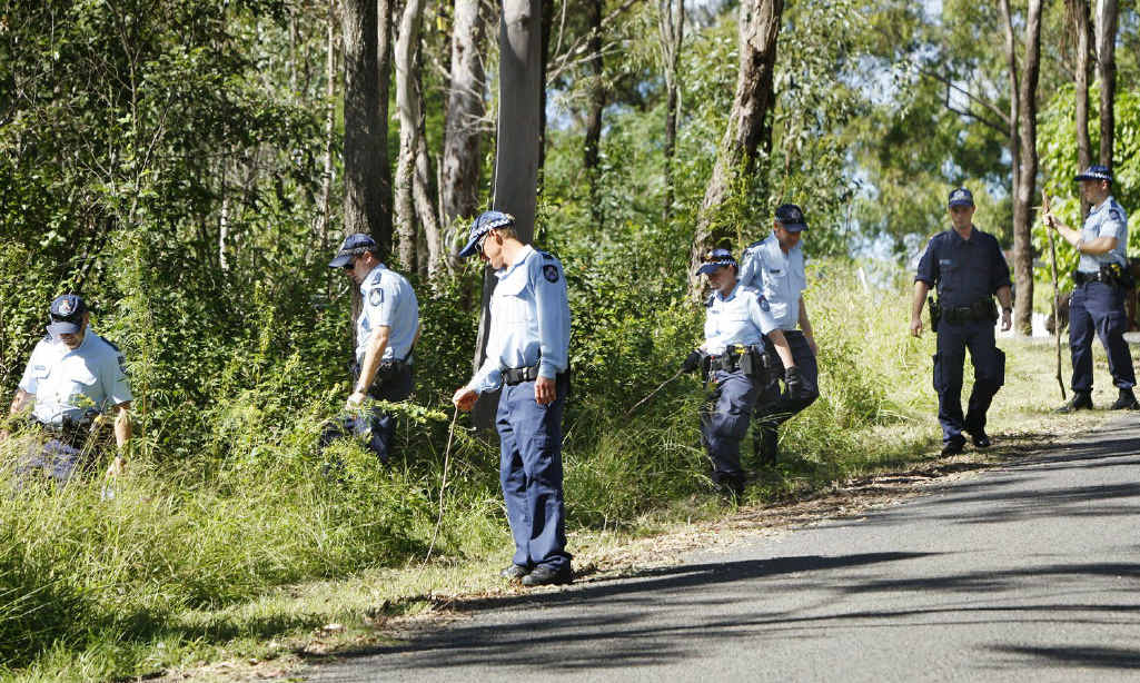 Police and SES crews search for evidence at Mt Crosby. Police and SES crews search for evidence at Mt Crosby.