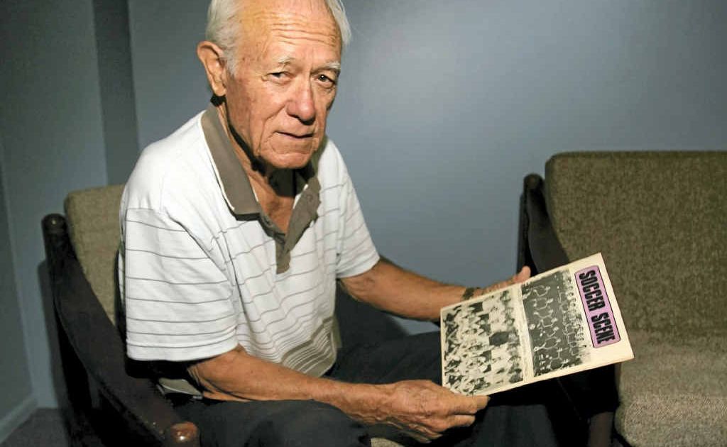 Doug Stewart looks over the memorabilia he has collected as a football player, coach and administrator. Doug Stewart looks over the memorabilia he has collected as a football player, coach and administrator.