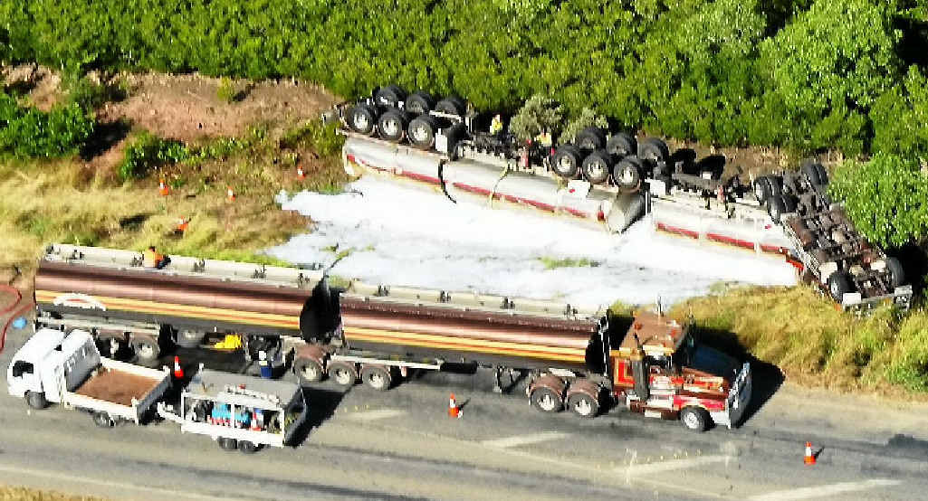 Port Curtis Way was closed for most of Tuesday, after an Emerald Carrying Company fuel tanker rolled on Monday night. Port Curtis Way was closed for most of Tuesday, after an Emerald Carrying Company fuel tanker rolled on Monday night.