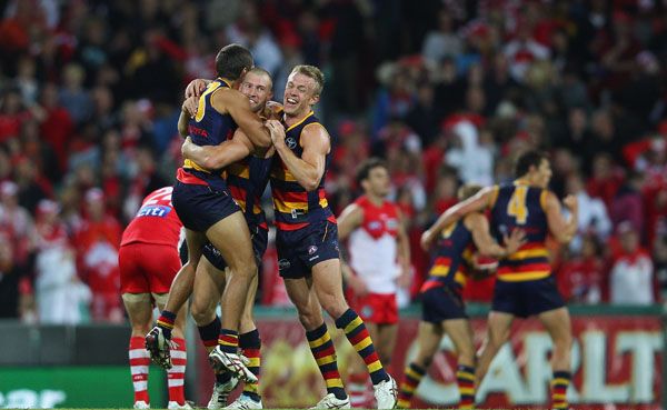 The Adelaide Crows players celebrate victory during the round six AFL match between the Sydney Swans and the Adelaide Crows at the Sydney Cricket Ground The Adelaide Crows players celebrate victory during the round six AFL match between the Sydney Swans and the Adelaide Crows at the Sydney Cricket Ground