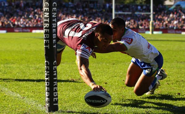 Dean Whare of the Sea Eagles scores a try during the round nine NRL match between the Manly Sea Eagles and the Canberra Raiders at Brookvale Oval Dean Whare of the Sea Eagles scores a try during the round nine NRL match between the Manly Sea Eagles and the Canberra Raiders at Brookvale Oval