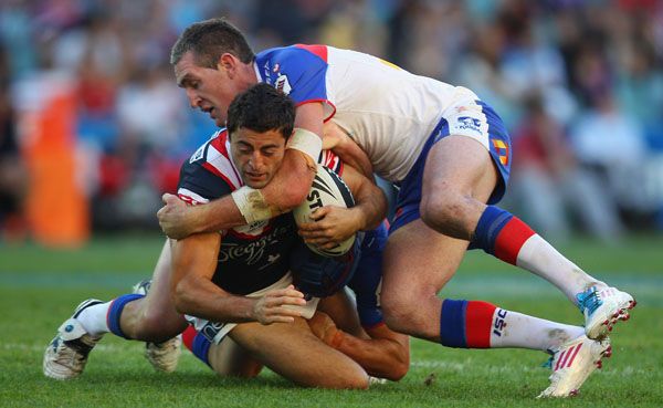 Anthony Minichiello of the Roosters is tackled during the round nine NRL match between the Sydney Roosters and the Newcastle Knights at Allianz Stadium Anthony Minichiello of the Roosters is tackled during the round nine NRL match between the Sydney Roosters and the Newcastle Knights at Allianz Stadium