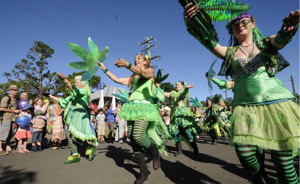 The Gunja Dancers make their way up Nimbin’s main street in the MardiGrass parade. The Gunja Dancers make their way up Nimbin’s main street in the MardiGrass parade.