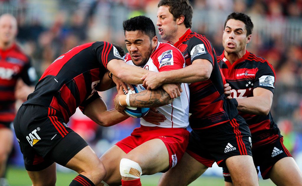 Anthony Faingaa of the Reds is tackled during the round 11 Super Rugby match between the Crusaders and the Reds at AMI Stadium Anthony Faingaa of the Reds is tackled during the round 11 Super Rugby match between the Crusaders and the Reds at AMI Stadium