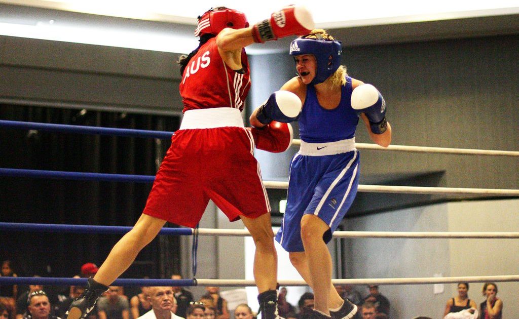 QLD amatuer boxing titles at the Caloundra RSL. Jessica Retallack (blue) V Sabrina Ostowari (red). QLD amatuer boxing titles at the Caloundra RSL. Jessica Retallack (blue) V Sabrina Ostowari (red).