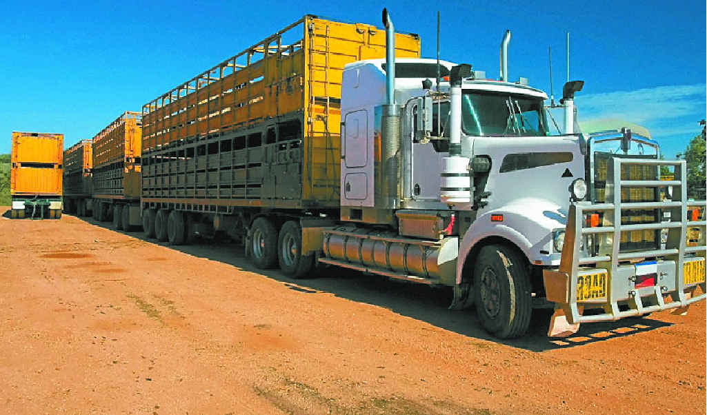 ROLLING ALONG: Research shows road trains with tri-axle dollies are more controllable at higher speeds.” ROLLING ALONG: Research shows road trains with tri-axle dollies are more controllable at higher speeds.”