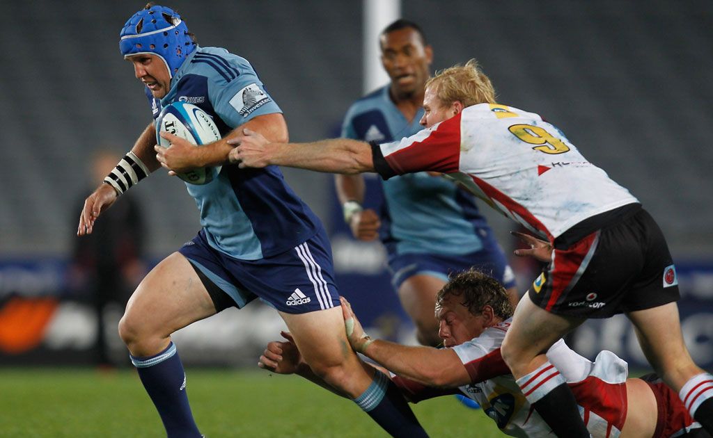 Blues James Parsons breaks away from Lions Ross Cronje during the round 12 Super Rugby match between the Blues and the Lions at Eden Park Blues James Parsons breaks away from Lions Ross Cronje during the round 12 Super Rugby match between the Blues and the Lions at Eden Park