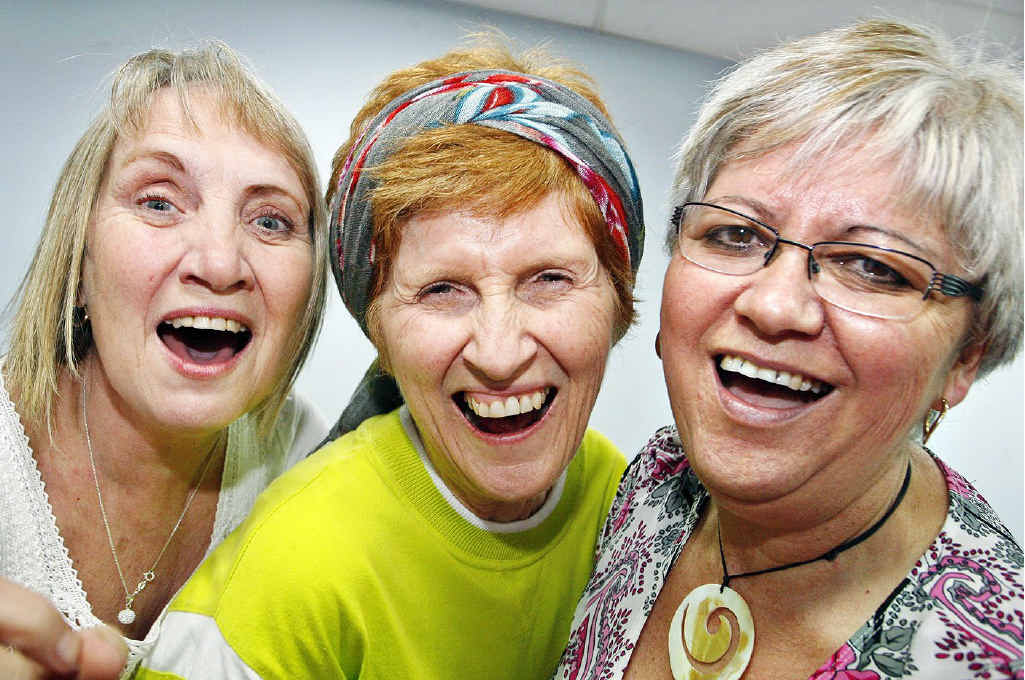 Laughter yoga teacher Lyn Burrows (centre) instructs Kathryn Lane and Margaret Baxter during a workshop. Laughter yoga teacher Lyn Burrows (centre) instructs Kathryn Lane and Margaret Baxter during a workshop.