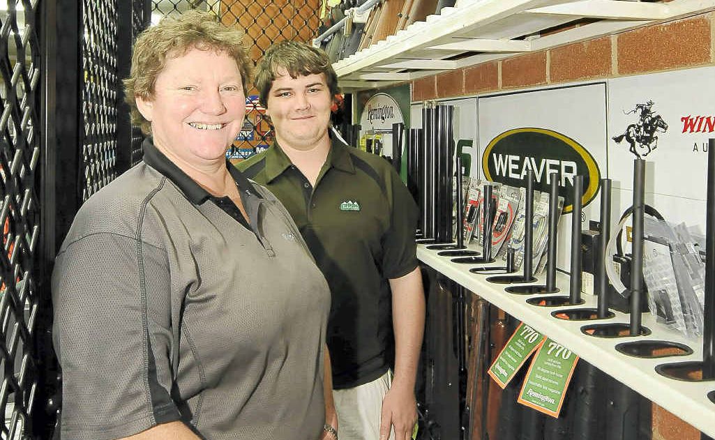 Owner of North Coast Firearms Sharon Greber and assistant Lachlan Donnelly in the shop’s gun storage area. Owner of North Coast Firearms Sharon Greber and assistant Lachlan Donnelly in the shop’s gun storage area.