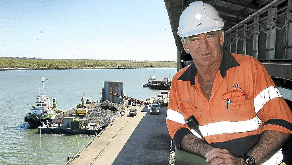 Queensland Sugar Limited workplace co-ordinator Garry Allen surveys the progress of the loading of quarried stone on to the first barge bound for Curtis Island, Gladstone. Queensland Sugar Limited workplace co-ordinator Garry Allen surveys the progress of the loading of quarried stone on to the first barge bound for Curtis Island, Gladstone.