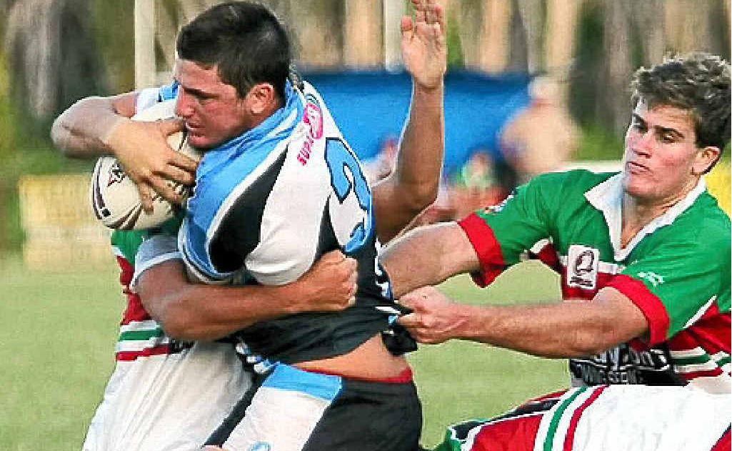 Bribie Island Warrigals under-19 player Matt Gillett proves a handful for three Nambour defenders on their try-line. Bribie Island Warrigals under-19 player Matt Gillett proves a handful for three Nambour defenders on their try-line.