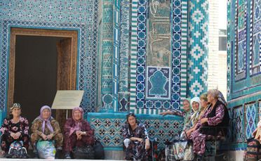 Pilgrims at Shahr-i-Zindah or the Tomb of the Living King, in Samarkand, Uzbekistan.
Pilgrims at Shahr-i-Zindah or the Tomb of the Living King, in Samarkand, Uzbekistan.