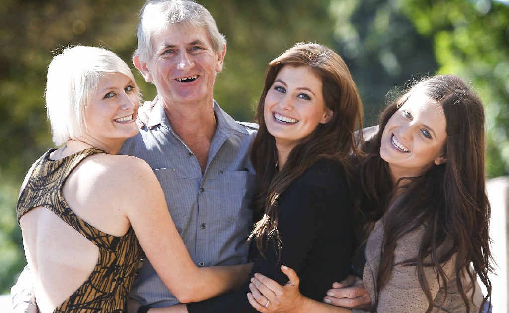 Peter McClymont gets a hug from his daughters (l-r) Mollie, Sam and Brooke McClymont prior to a Mayoral Reception yesterday. Peter McClymont gets a hug from his daughters (l-r) Mollie, Sam and Brooke McClymont prior to a Mayoral Reception yesterday.