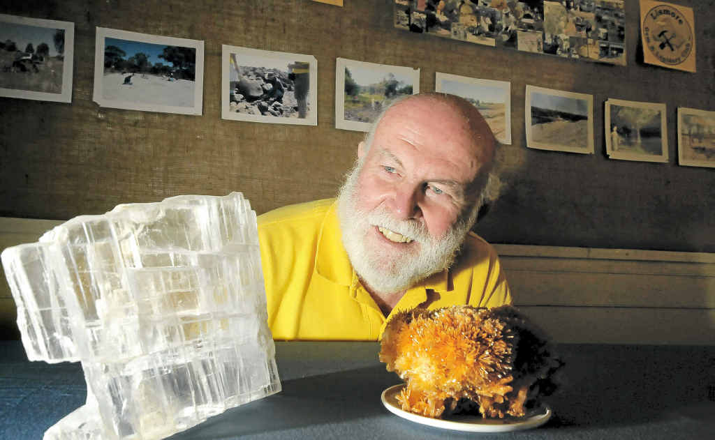 Lismore Gem and Lapidary club president Bruce Copper, with calcite and gypsum specimens, is ready for Gemfest. 