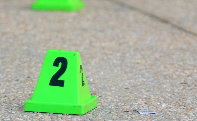 Evidence markers on road at the crime scene in Robina killing. Photo: John Gass / Tweed Daily News TWE170511crime Evidence markers on road at the crime scene in Robina killing. Photo: John Gass / Tweed Daily News TWE170511crime