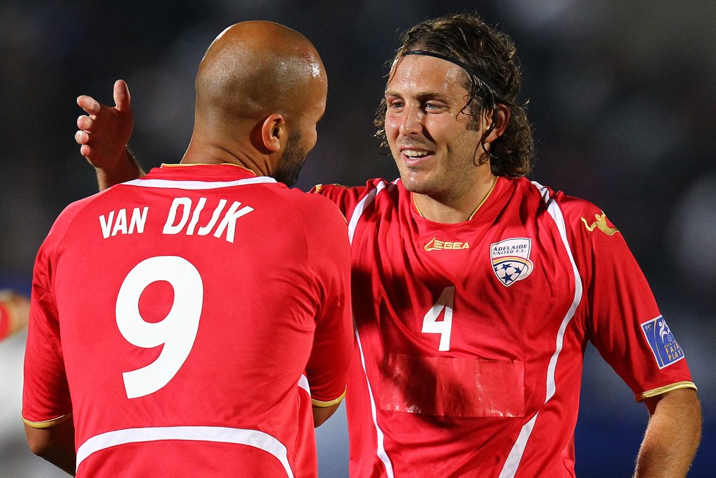 Sergio van Dijk (back) of Adelaide celebrates the first goal with team-mate Jonathan McKain during the AFC Champions League Group E match between Gamba Osaka and Adelaide United at Expo '70 Stadium on May 16, 2012 in Osaka, Japan. 