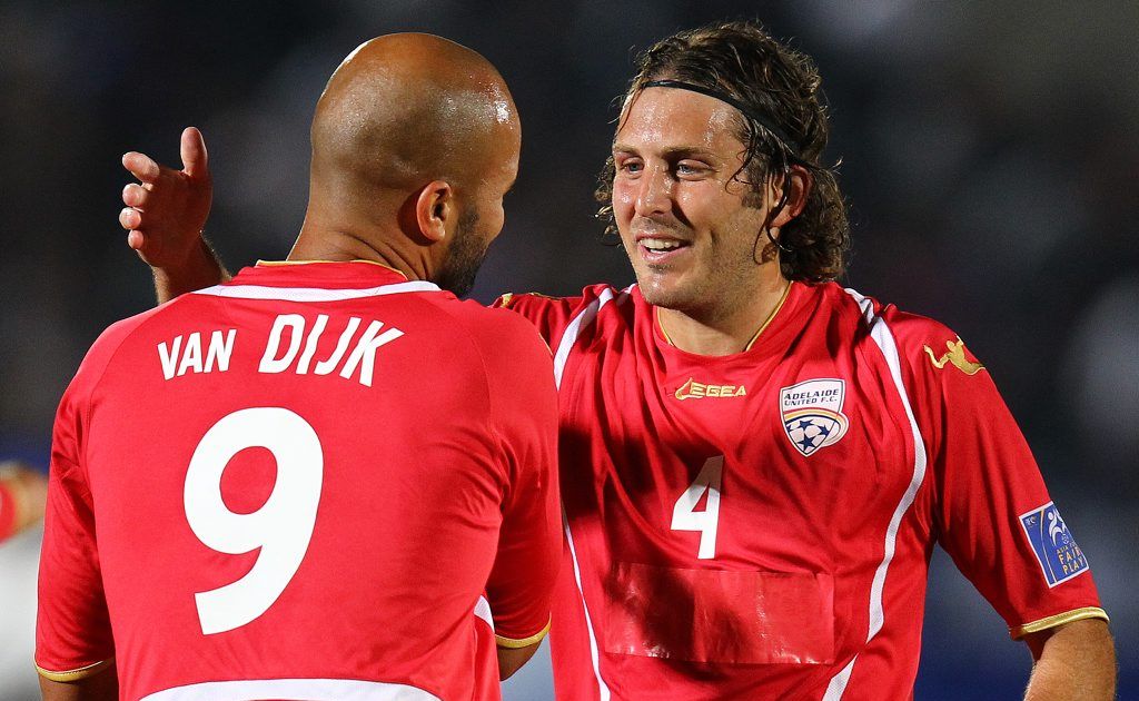 Sergio van Dijk (back) of Adelaide celebrates the first goal with team-mate Jonathan McKain during the AFC Champions League Group E match between Gamba Osaka and Adelaide United at Expo '70 Stadium on May 16, 2012 in Osaka, Japan. Sergio van Dijk (back) of Adelaide celebrates the first goal with team-mate Jonathan McKain during the AFC Champions League Group E match between Gamba Osaka and Adelaide United at Expo '70 Stadium on May 16, 2012 in Osaka, Japan.