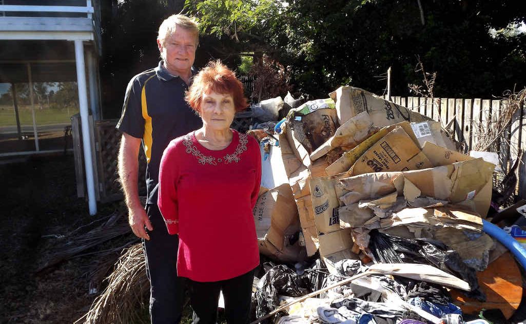 Landlord Marilyn Paton is supported by friend Stan Wilczynski after tenants left a mess out the front of the rental property she owns. Landlord Marilyn Paton is supported by friend Stan Wilczynski after tenants left a mess out the front of the rental property she owns.