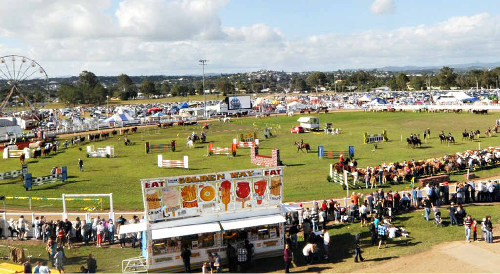 All the exhibitors line up for the official opening of the Gympie Show. All the exhibitors line up for the official opening of the Gympie Show.