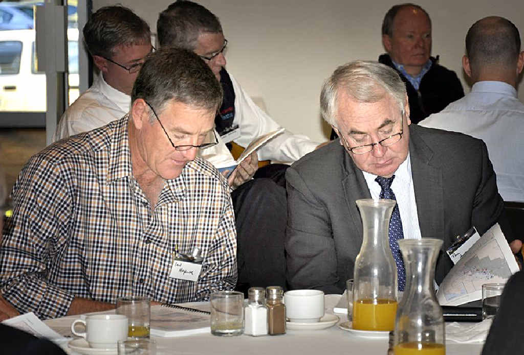 Dalby farmer Ian Hayllor (left) and Toowoomba Mayor Paul Antonio check the details at the release of the Queensland Water Commission’s Underground Water Impact Report. Dalby farmer Ian Hayllor (left) and Toowoomba Mayor Paul Antonio check the details at the release of the Queensland Water Commission’s Underground Water Impact Report.